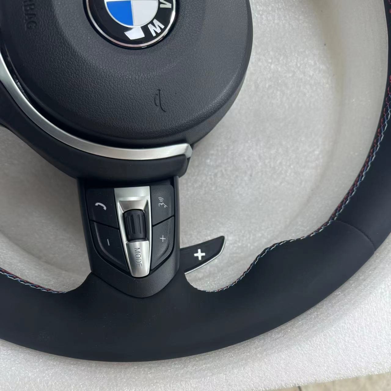 Hot sale black sports car steering wheels leather steering wheel price for BMW