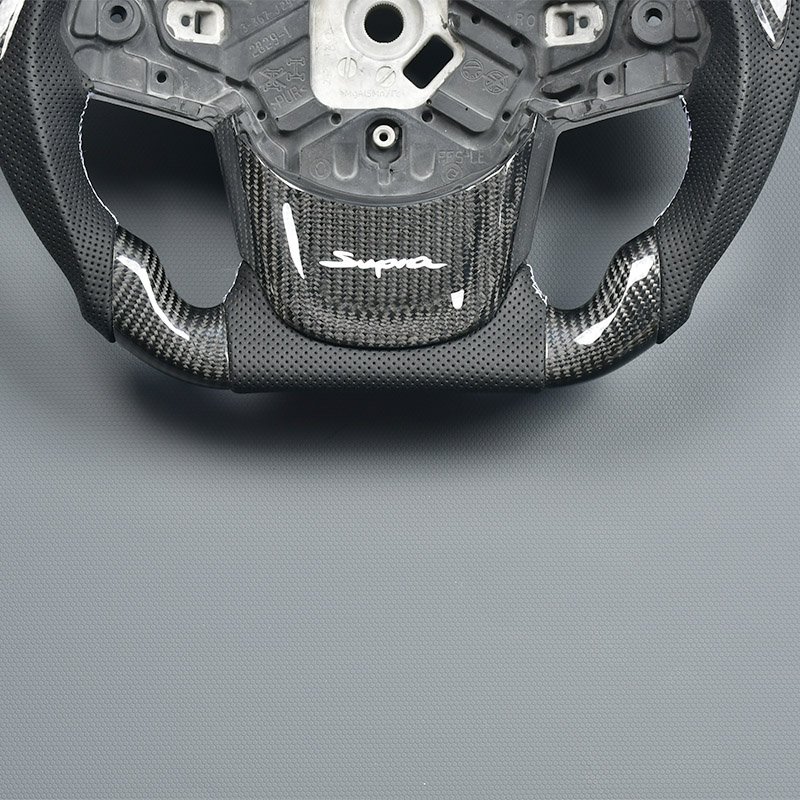 Customized genuine carbon fiber car steering wheel in black perforated leather for Toyota Supra A90