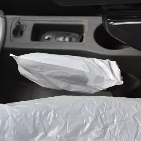 Factory Price Universal 5 in 1 set Plastic Disposable Car Seat Covers Steering Wheel Cover for Cars