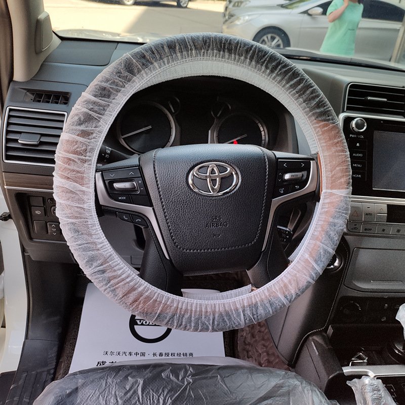Non-woven fabric car steering wheel cover car steering wheel cover transparent and white color with elastic band