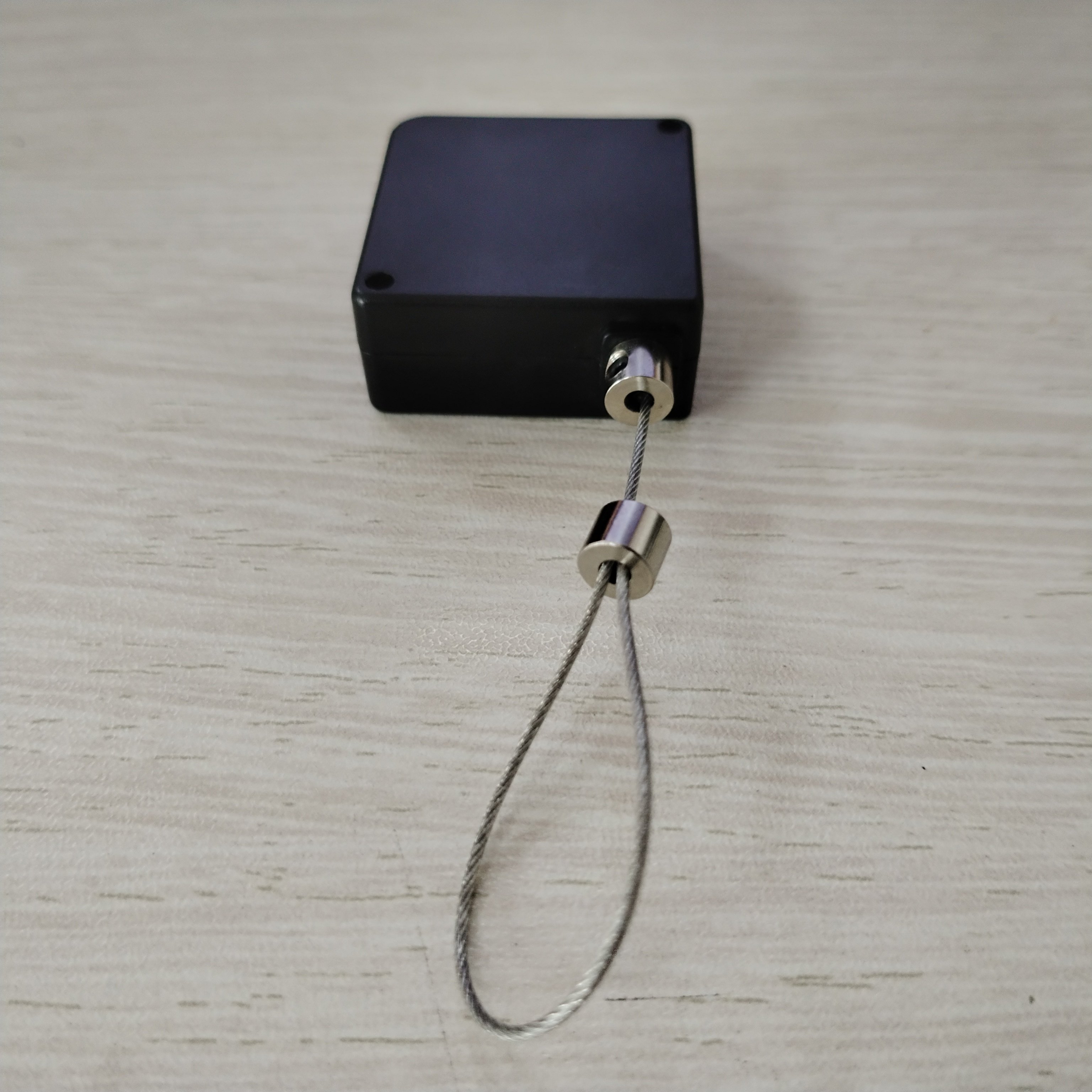 B1103 Auto Retractable Cable Lock Oval Double-sided Adhesive Anti-theft Anti-lost Pull Box