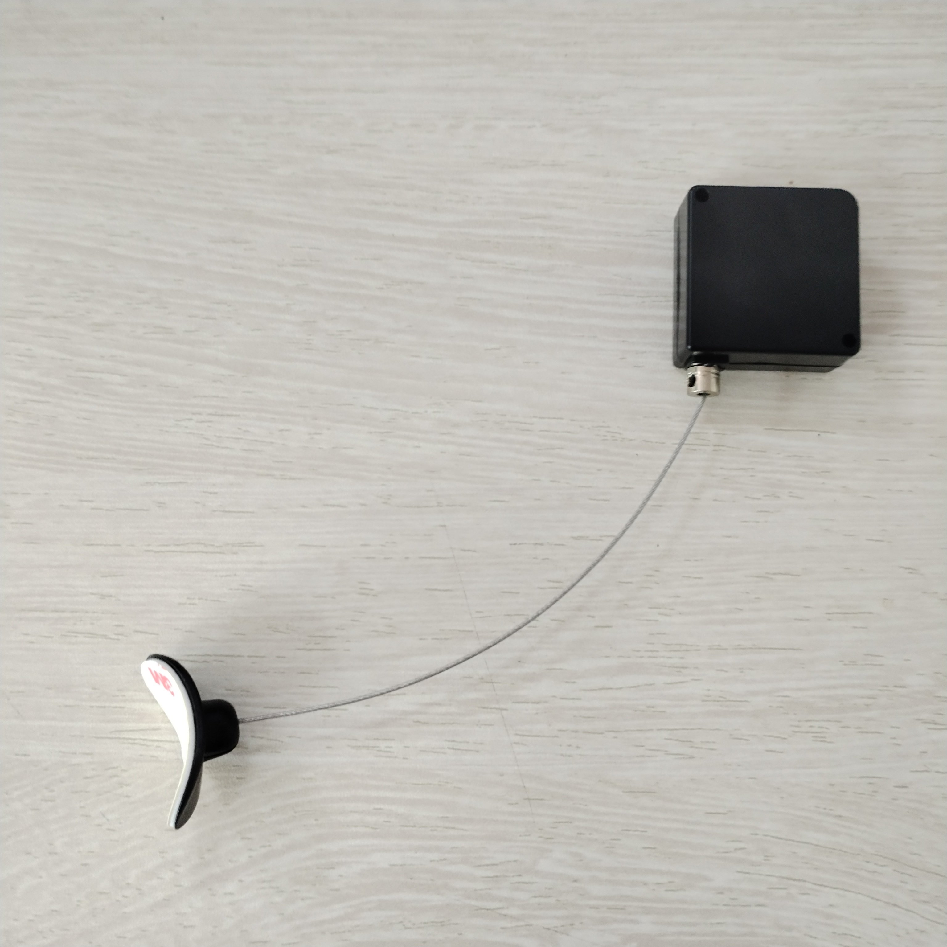 B1103 Auto Retractable Cable Lock Oval Double-sided Adhesive Anti-theft Anti-lost Pull Box