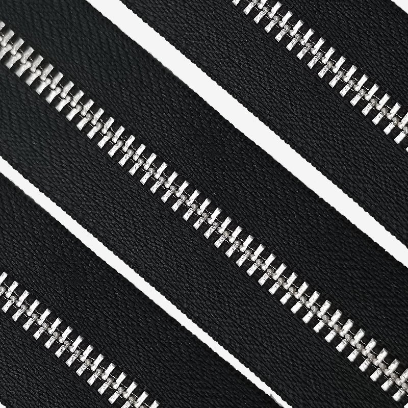 Jinhua Yiwu Metal Titanium Aluminum Alloy Zips Cremalleras Zipper Per Meter Zippers Tape by the Yard for Jacket Jeans