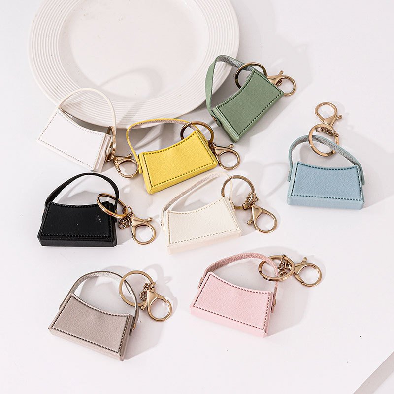 Portable lipstick bag creative small mirror keychain gift PU leather car bag charm keychain