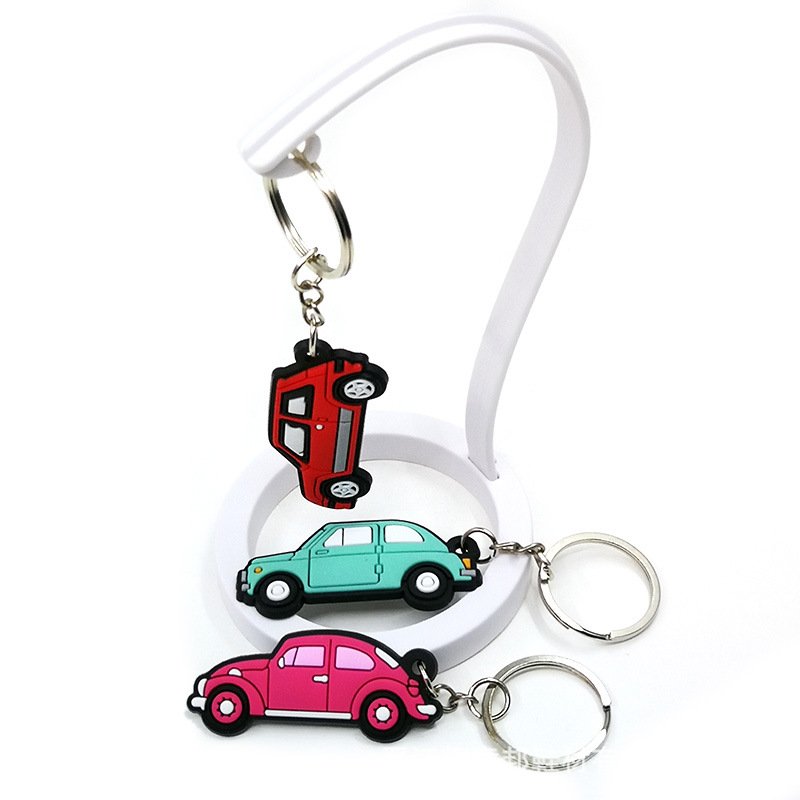 New Arrival Custom Logo PVC 2D Cartoon Car Airplane Light Keychain Soft Rubber with Iron Metal Customizable Keychain