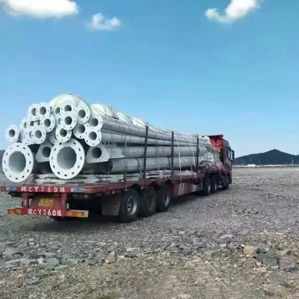 Factory price Polygon Galvanized steel 18m 20m 25m 30m telescopic lifting system HDG high mast light pole