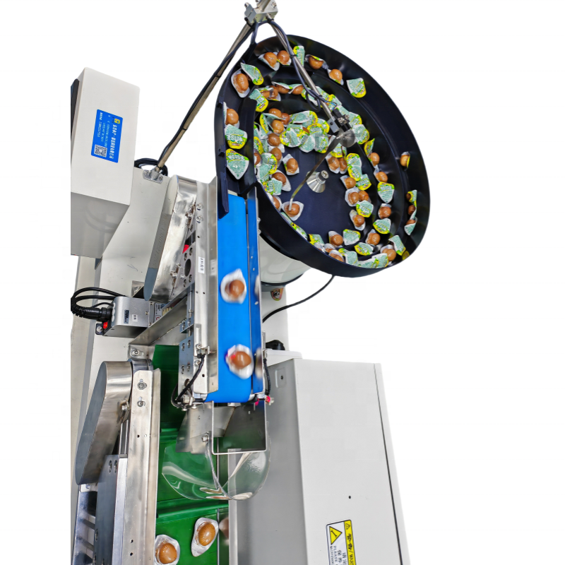 697 Vibrating Bowl Feed Counting Bag Packing Machine Quail Egg Vibrating Plate Particle Counting Feed Bag Packing Machine