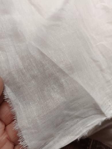 8303. Castle sand washing cotton is thin, soft, comfortable, slightly translucent half -drifting white summer clothing fabric tail goods