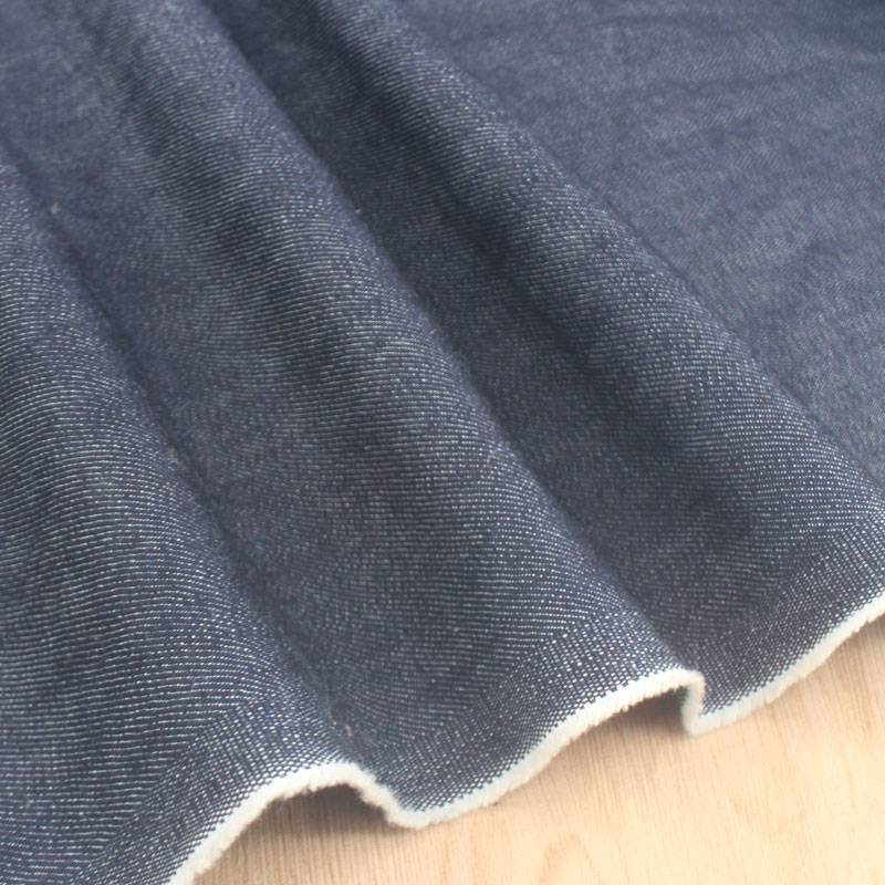 Dark blue water washing micro -bullet diagonal cotton denim cloth jacket coat jeans jeans short skirt DIY fabric