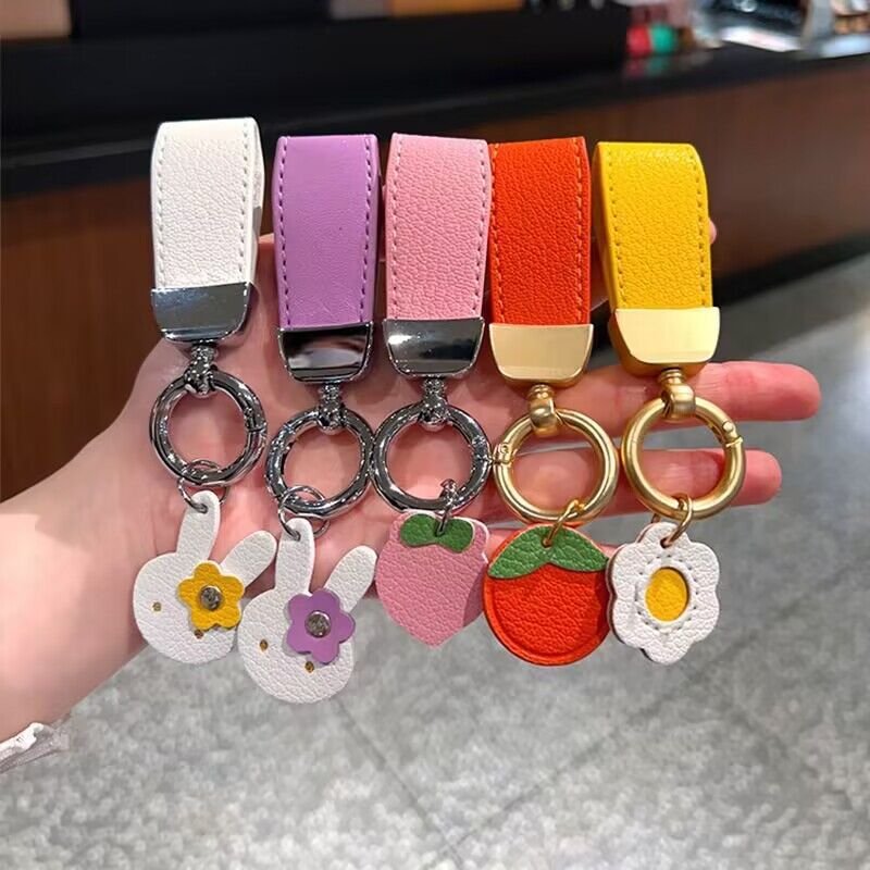 Wholesale Hot Sale Cute Cartoon Leather Car Key Hanging Trinket Leather Luxury Keyring Female Fashion Strawberry Fruit Key Chain