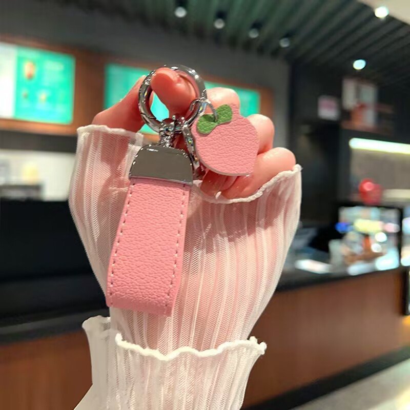 Wholesale Hot Sale Cute Cartoon Leather Car Key Hanging Trinket Leather Luxury Keyring Female Fashion Strawberry Fruit Key Chain