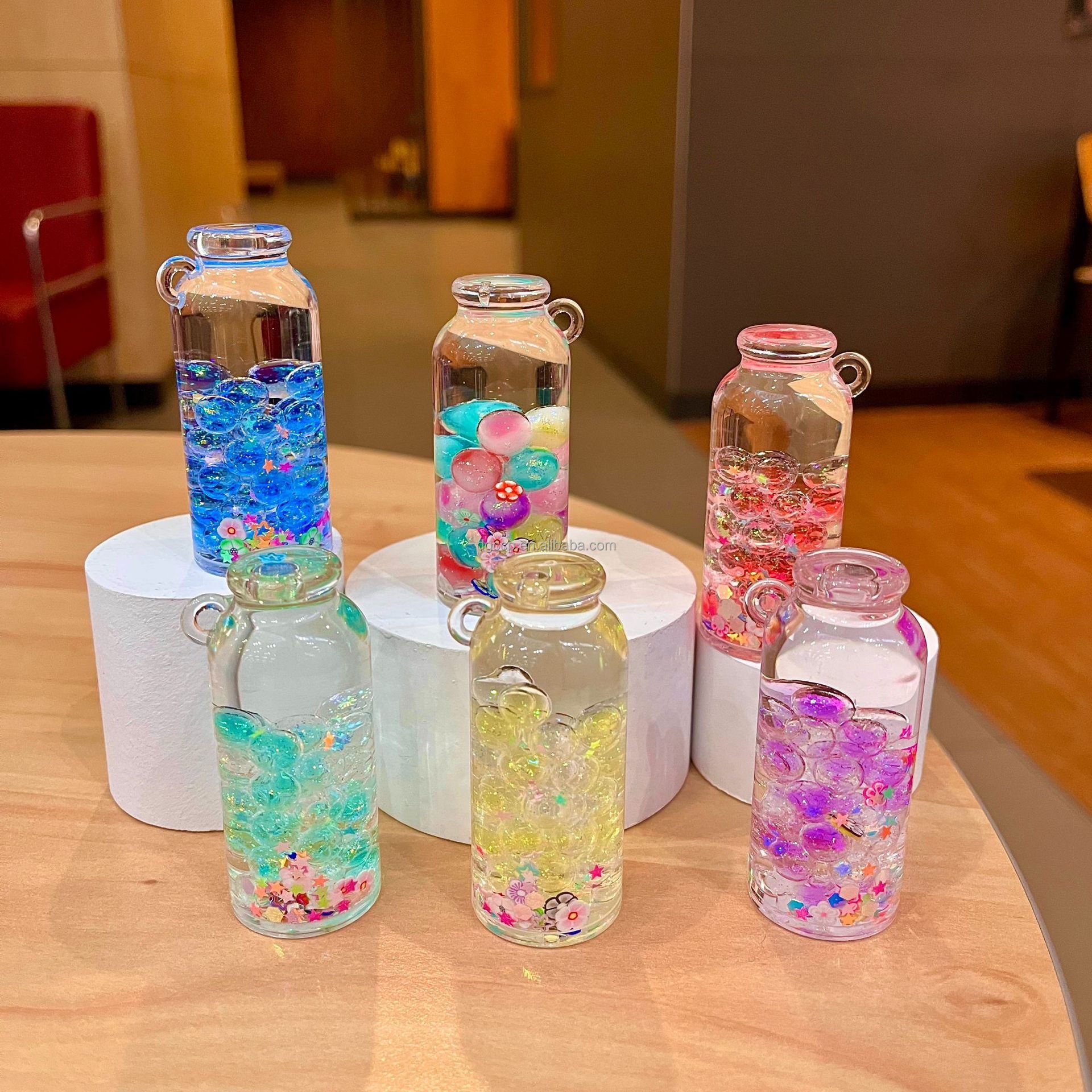 1batch=10PCS 300 design Cars lollipops Heart whale airplane shaped Animal doll Liquid Floating Acrylic bag Keychain