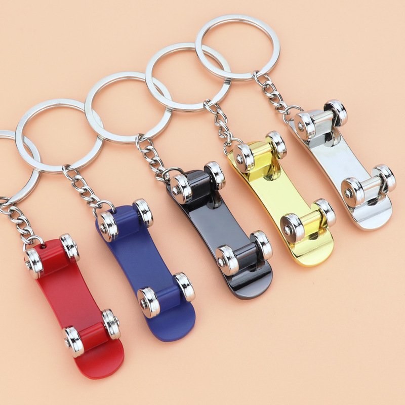 Color Creative Sport Scooter Keychain Custom Laser Logo Printing Logo metal finger school bag small pendant roller Car key chain