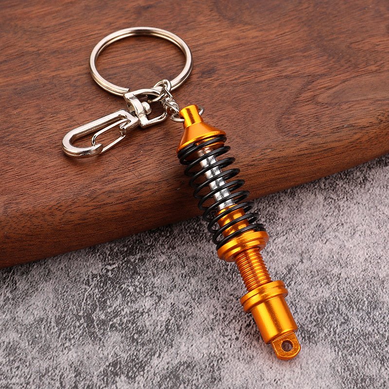 Wholesale metal spring keyring auto key ring car parts accessories shock absorber keychain