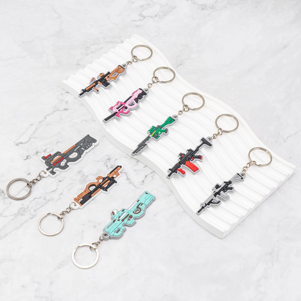 wholesale pvc keychains hot sale anime figure custom keyring friends Cartoon gun key holder fit fans souvenir gift