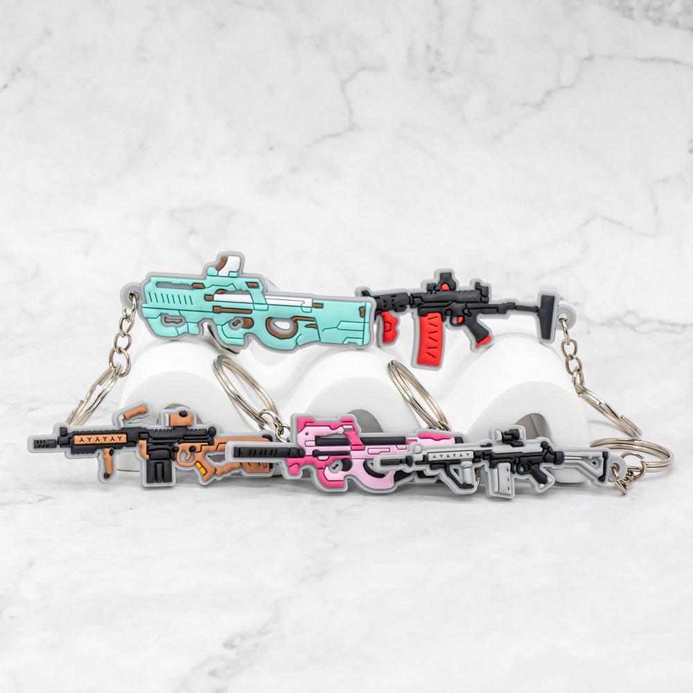 wholesale pvc keychains hot sale anime figure custom keyring friends Cartoon gun key holder fit fans souvenir gift