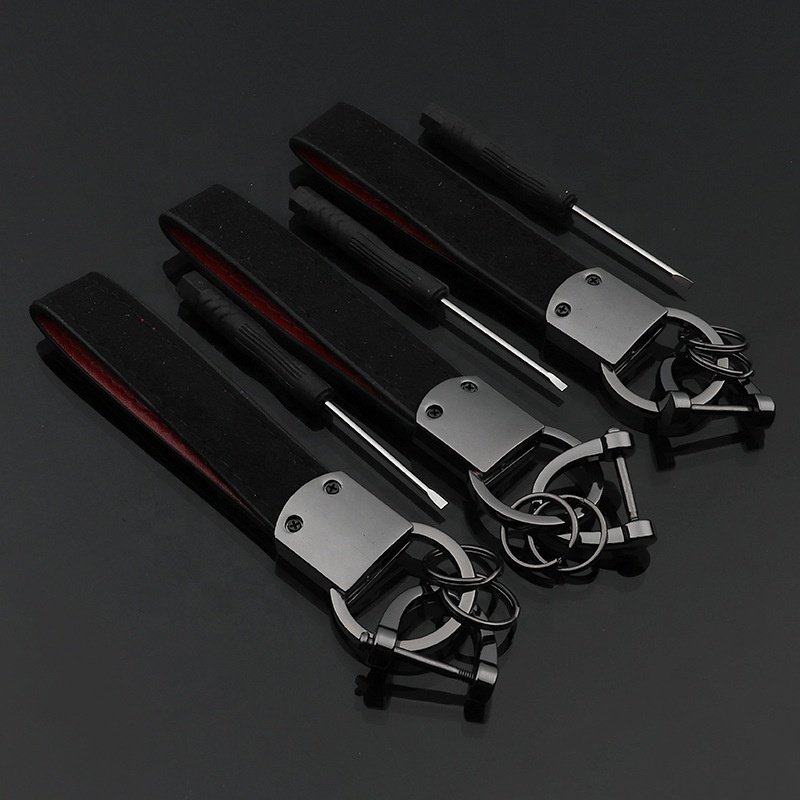 Wholesale Custom logo Black Genuine Rubber Metal genshin car Key Chain Tassel keychain clip Leather wrist coil car keychain