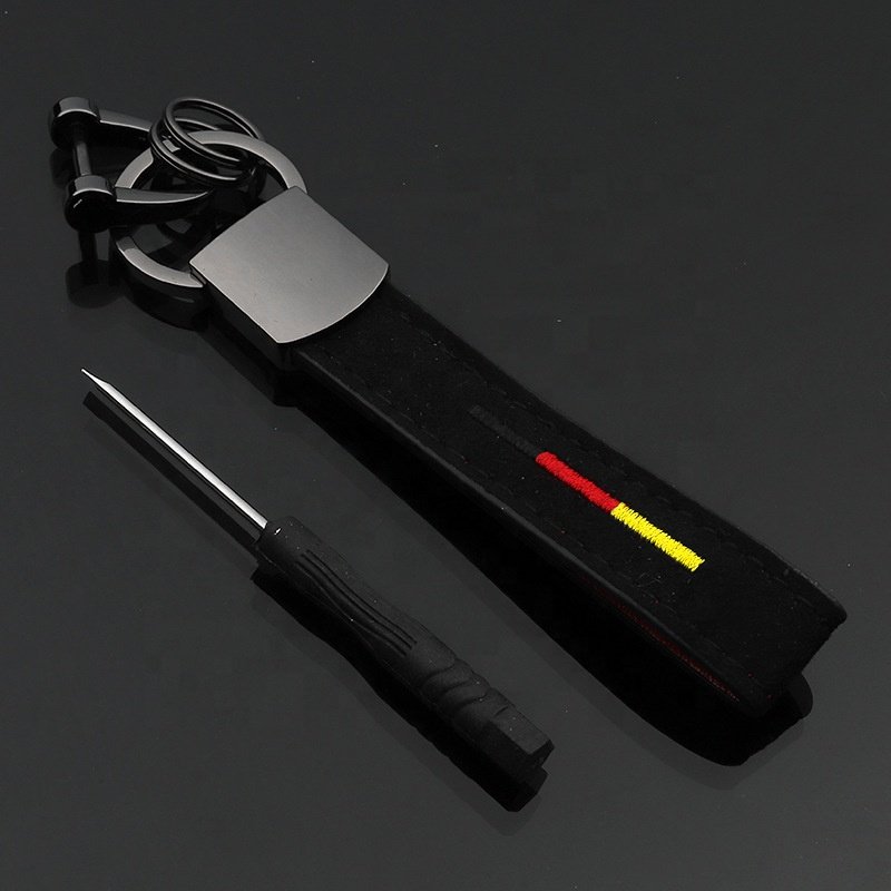 Wholesale Custom logo Black Genuine Rubber Metal genshin car Key Chain Tassel keychain clip Leather wrist coil car keychain