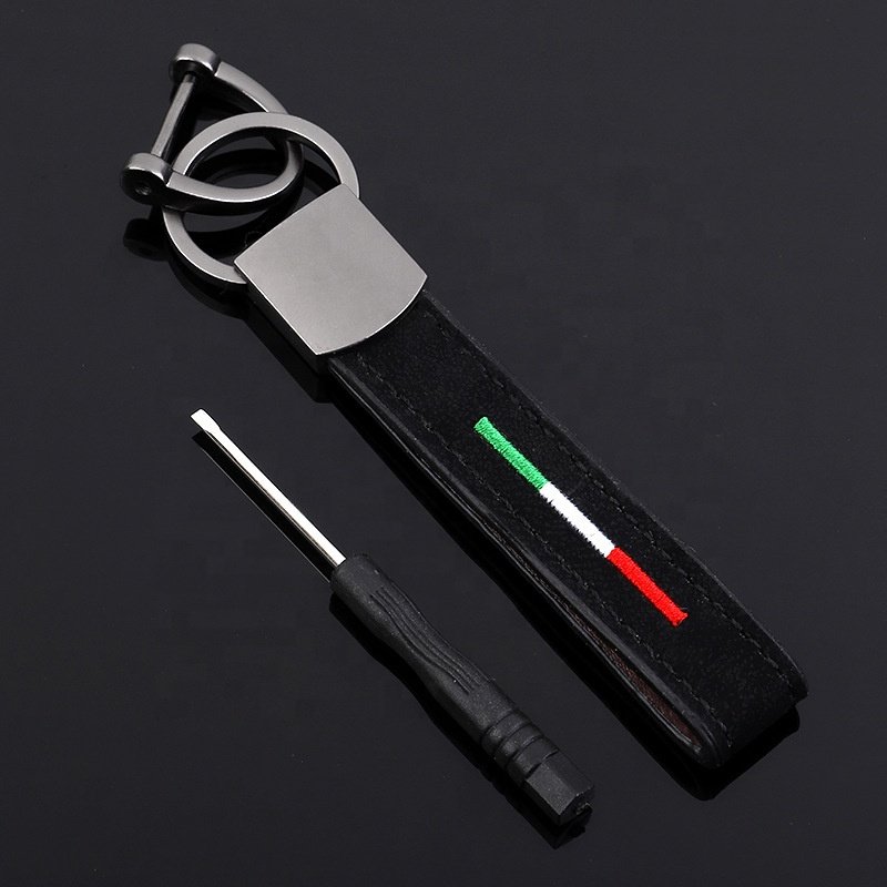 Wholesale Custom logo Black Genuine Rubber Metal genshin car Key Chain Tassel keychain clip Leather wrist coil car keychain