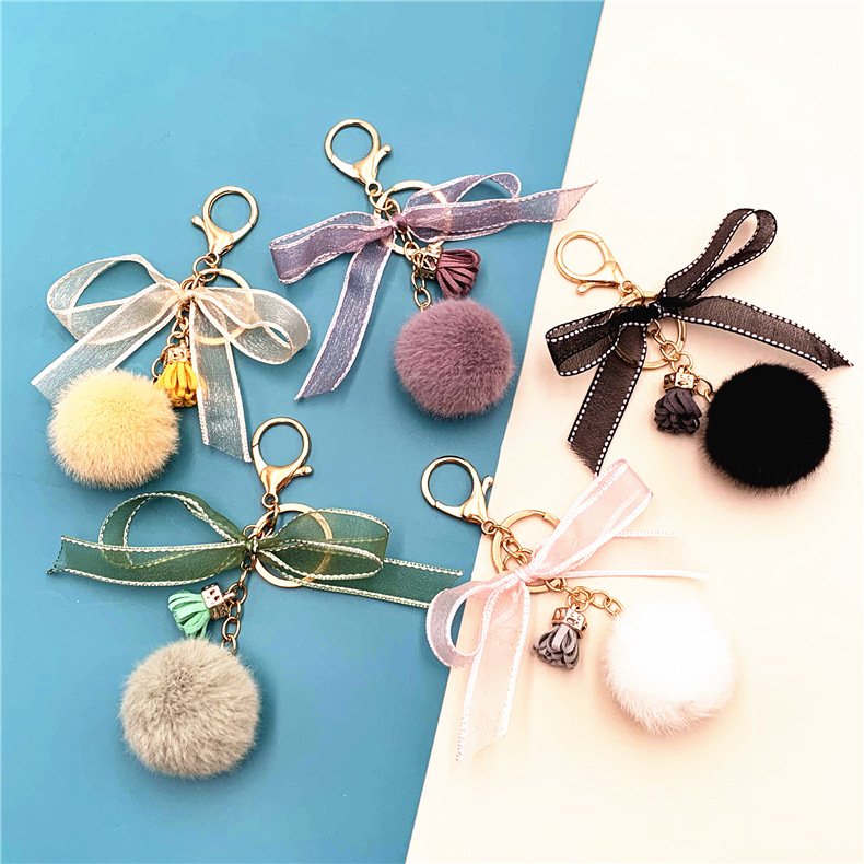 Cute bow keychain Lace hairball bag plush pendant Cartoon car key chain small gift accessories manufacturer wholesale