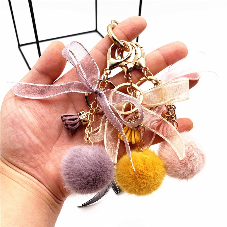 Cute bow keychain Lace hairball bag plush pendant Cartoon car key chain small gift accessories manufacturer wholesale
