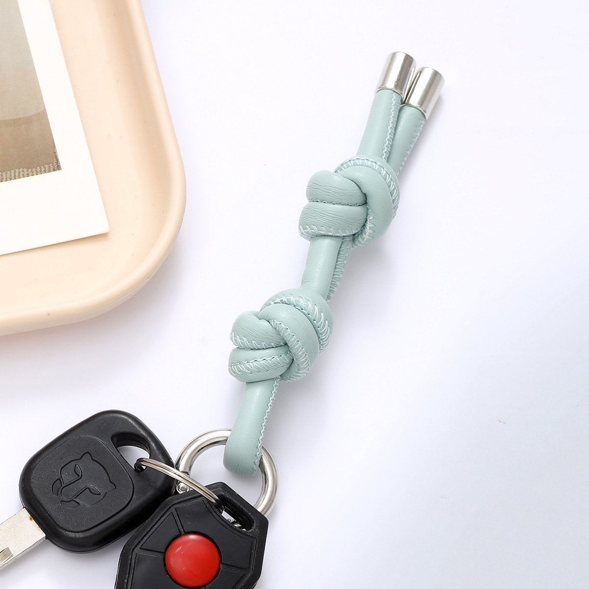 New DIY leather keychain niche simple candy color leather rope woven bag hanging decoration with leisure car key chain pendant