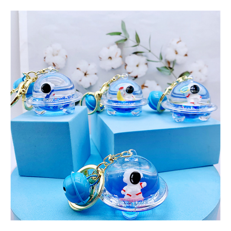 Wholesale Cartoon Blue Acrylic Astronaut Key Accessories Bag Pendant Car Keyring Floating Oil Key Chain Liquid Keychain