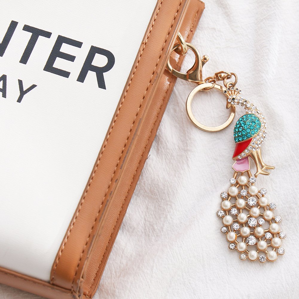 New Design Exquisite Diamond Openwork Feather Golden Stainless Steel Metal Clasp Peacock Keychain For Friends
