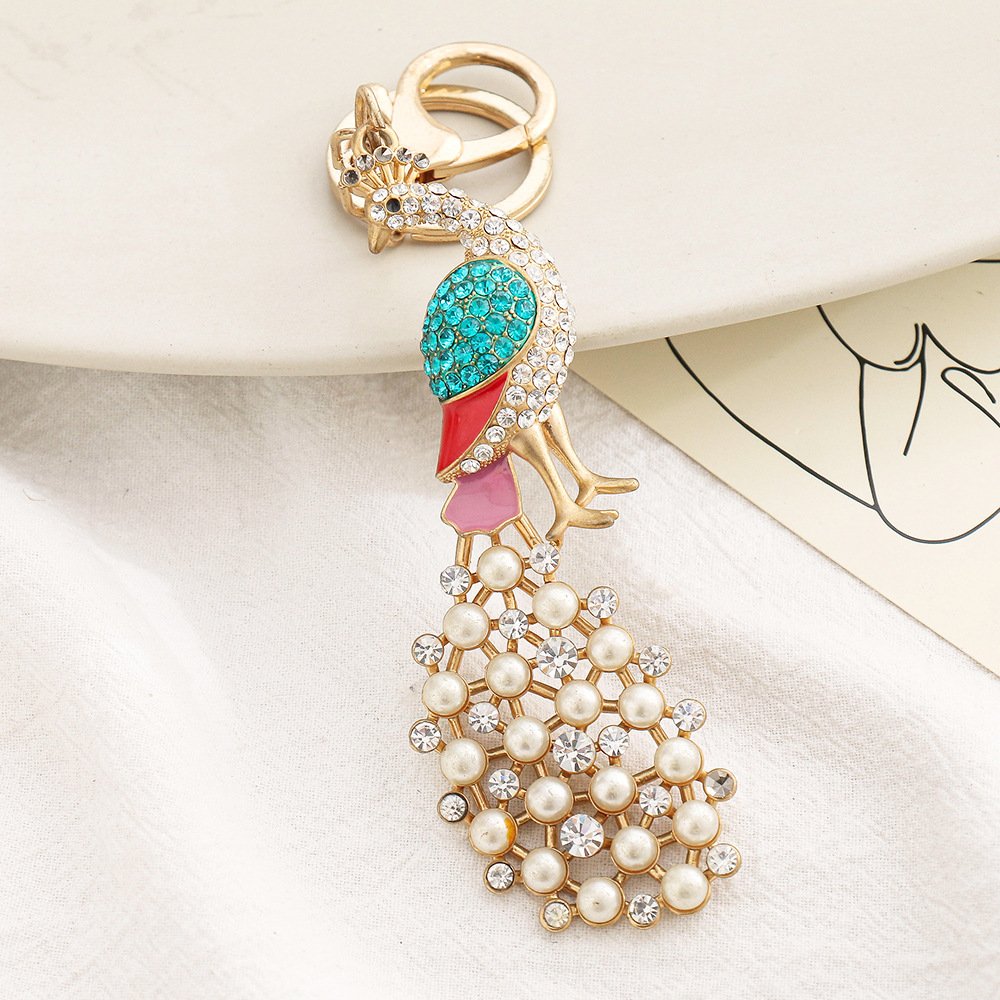 New Design Exquisite Diamond Openwork Feather Golden Stainless Steel Metal Clasp Peacock Keychain For Friends