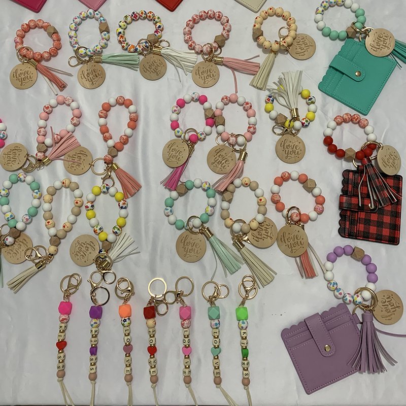 Factory Wholesale Custom Car Accessories Silicone Beads Wristlet Bracelet Wallet Keychain With Tassel Wood Disc For Women