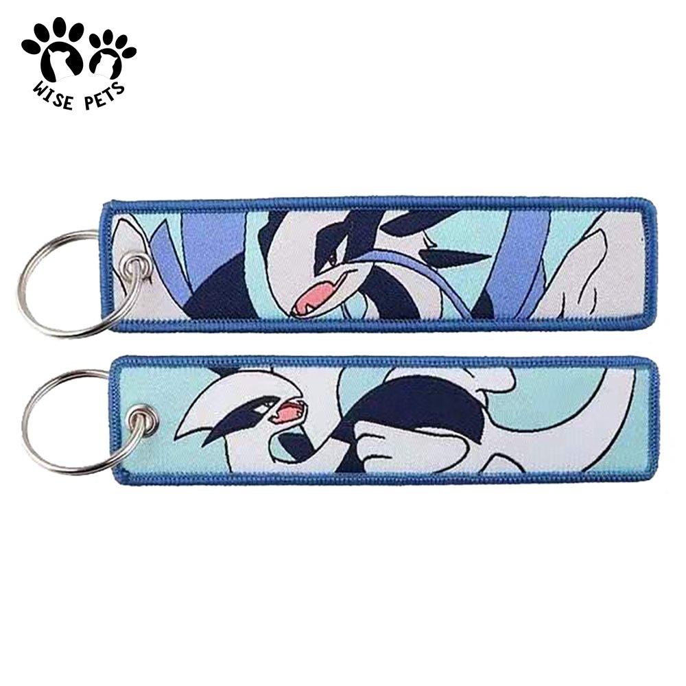 Factory wholesale high quality custom design key tag Japan anime jet kawaii keychain textile fabrics embroidery woven key rings