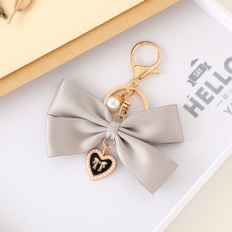 Luxury Pearl Keychain Heart Bow Handmade Fashionable Cheerleading Car Keychain Pendant New Fabric Ribbon Bow Pendant Accessories