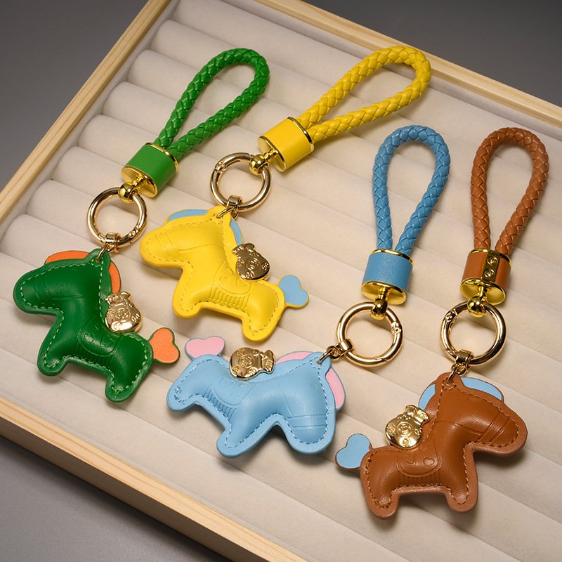 2014 Fashion wholesale pu pony pendant woven wrist strap cute car bag key chain gift