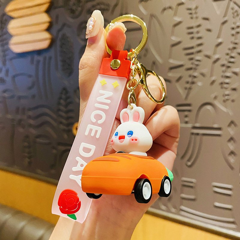 Factory Custom Movable Key Chain Rubber Car Doll Children's Toys with UV Printing for Holidays Conferences Small Gifts Wholesale