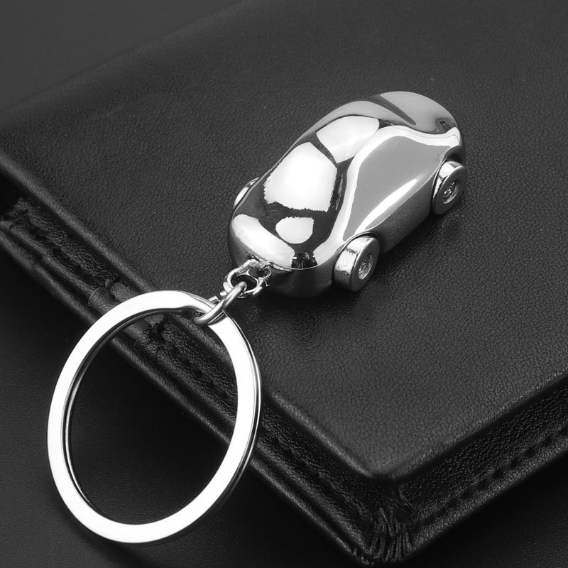Xun Xin Custom Logo Hot Sell Luxury 3D Mini SUV Car Mold Metal Keyring Moved Wheels Car Shape Keychain for Business Gifts