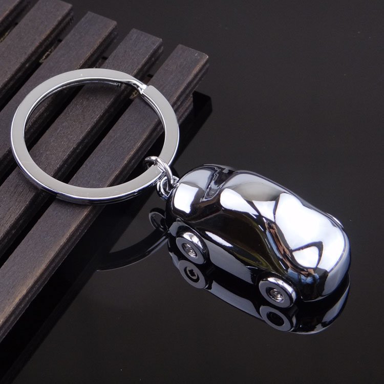 Xun Xin Custom Logo Hot Sell Luxury 3D Mini SUV Car Mold Metal Keyring Moved Wheels Car Shape Keychain for Business Gifts