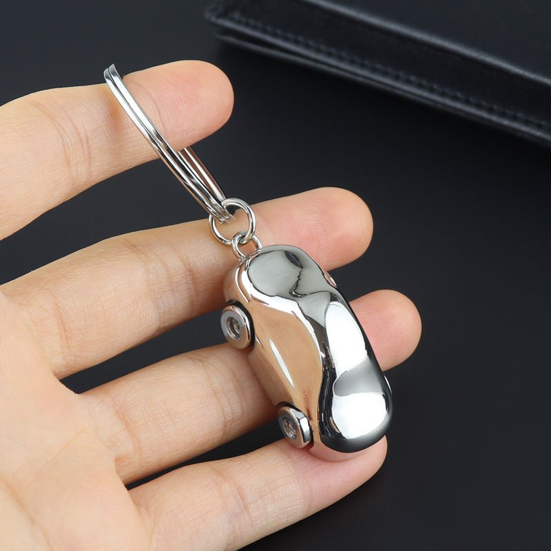 Xun Xin Custom Logo Hot Sell Luxury 3D Mini SUV Car Mold Metal Keyring Moved Wheels Car Shape Keychain for Business Gifts