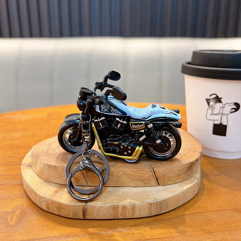 Sanli Motorcycle Keychain Cartoon Doll School Bag Pendant Couple Car Keychain Accessories Small Gift Wholesale