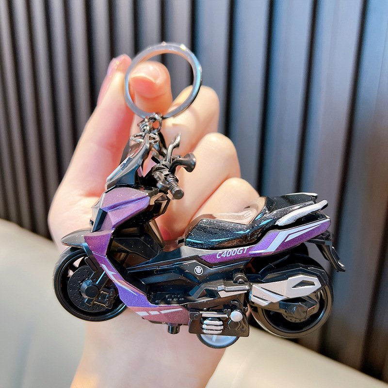 Sanli Motorcycle Keychain Cartoon Doll School Bag Pendant Couple Car Keychain Accessories Small Gift Wholesale