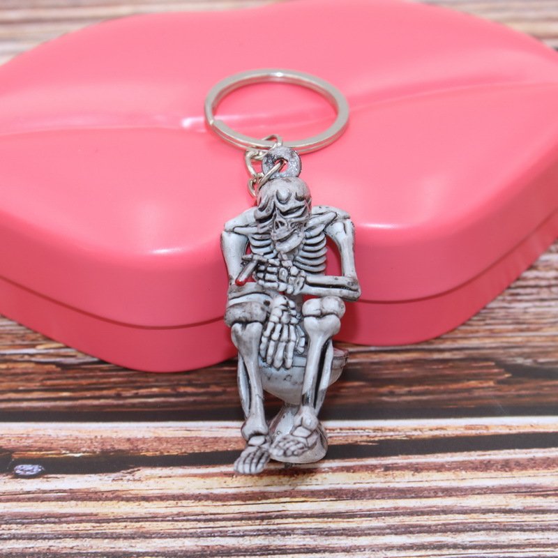1 pc Trendy Creative grey Skulls skeleton Toilet Purse Bag Rubber Keychain Keyring Key Chain Gift car accessory bag pendant