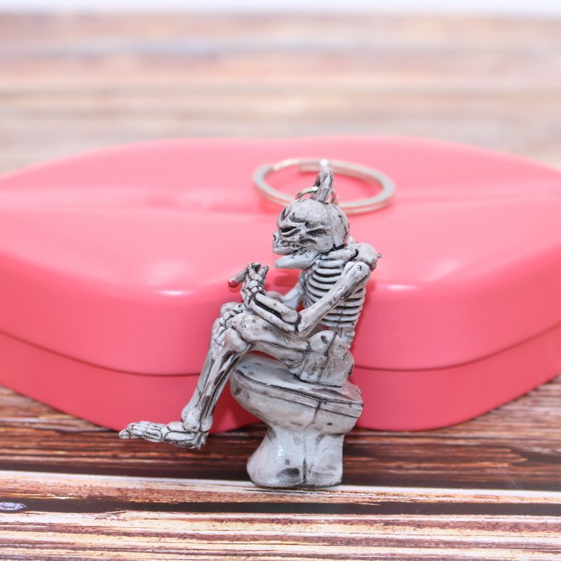 1 pc Trendy Creative grey Skulls skeleton Toilet Purse Bag Rubber Keychain Keyring Key Chain Gift car accessory bag pendant
