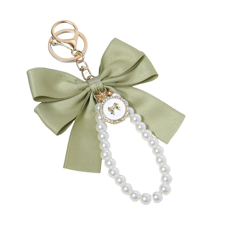 Fashion handmade beaded bow key chain Pearl wristband Pearl chain Key ring Attractive women's bag Pearl key chain pendant gift