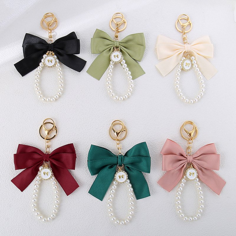 Fashion handmade beaded bow key chain Pearl wristband Pearl chain Key ring Attractive women's bag Pearl key chain pendant gift