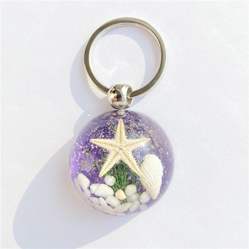 New starfish amber keychain simple cartoon resin bag car key chain pendant accessories seaside tourism souvenirs gift wholesale