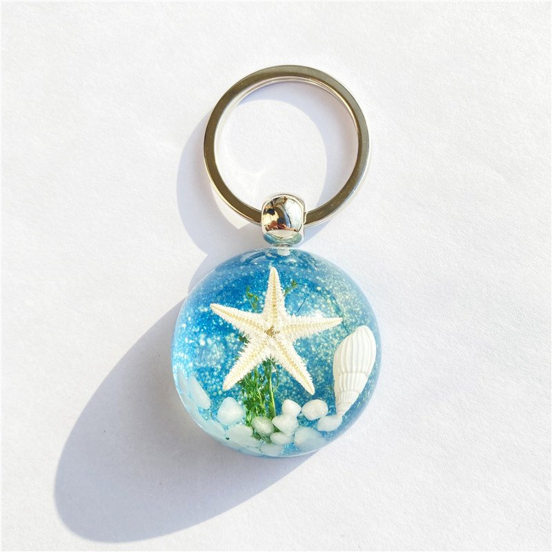 New starfish amber keychain simple cartoon resin bag car key chain pendant accessories seaside tourism souvenirs gift wholesale