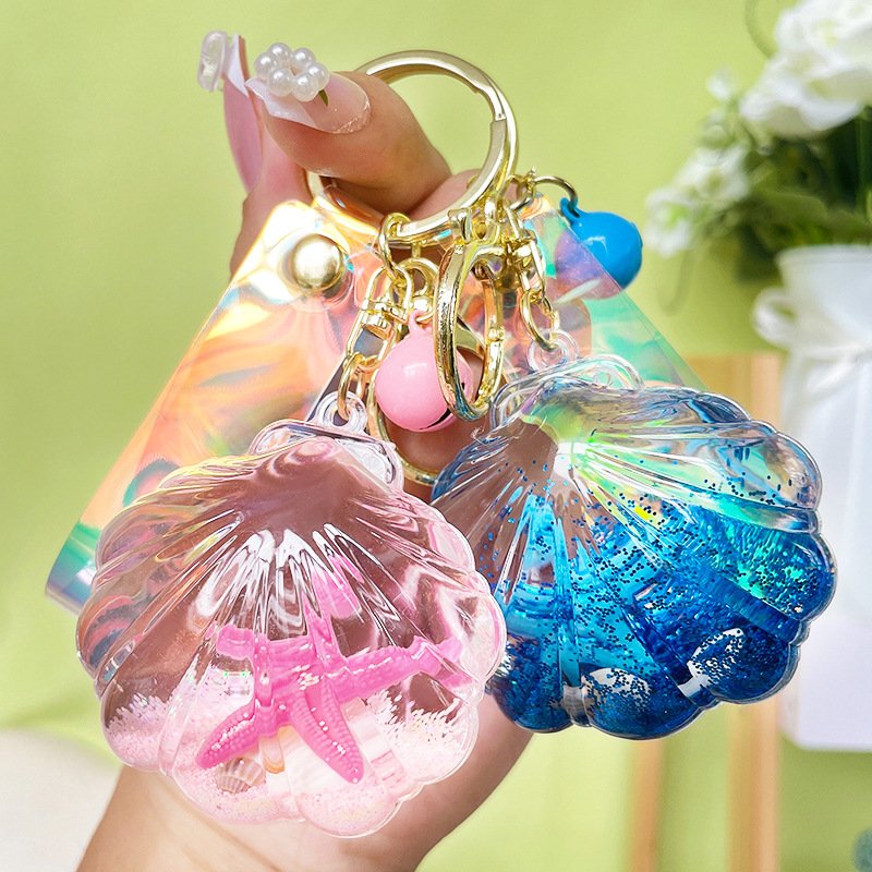 Creative acrylic Starfish shell keychain Fashion trend liquid quicksand pendant car key chain accessories girls bag decoration