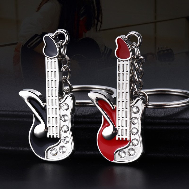 Creative 3D alloy music earphone notes Piano violin keychain Men's pendant car key chain Girl's bag decoration gift wholesale