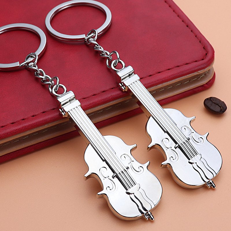 Creative 3D alloy music earphone notes Piano violin keychain Men's pendant car key chain Girl's bag decoration gift wholesale
