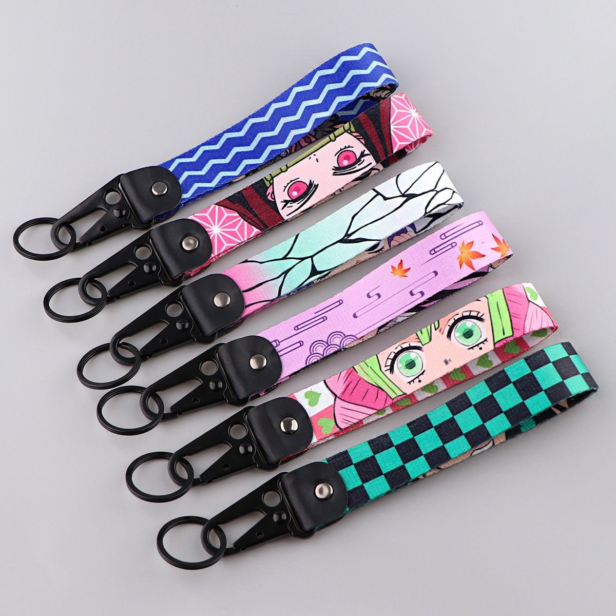 Small gift wholesale anime demon killer character Olecranon keychain pendant leather metal unique car fashion accessories