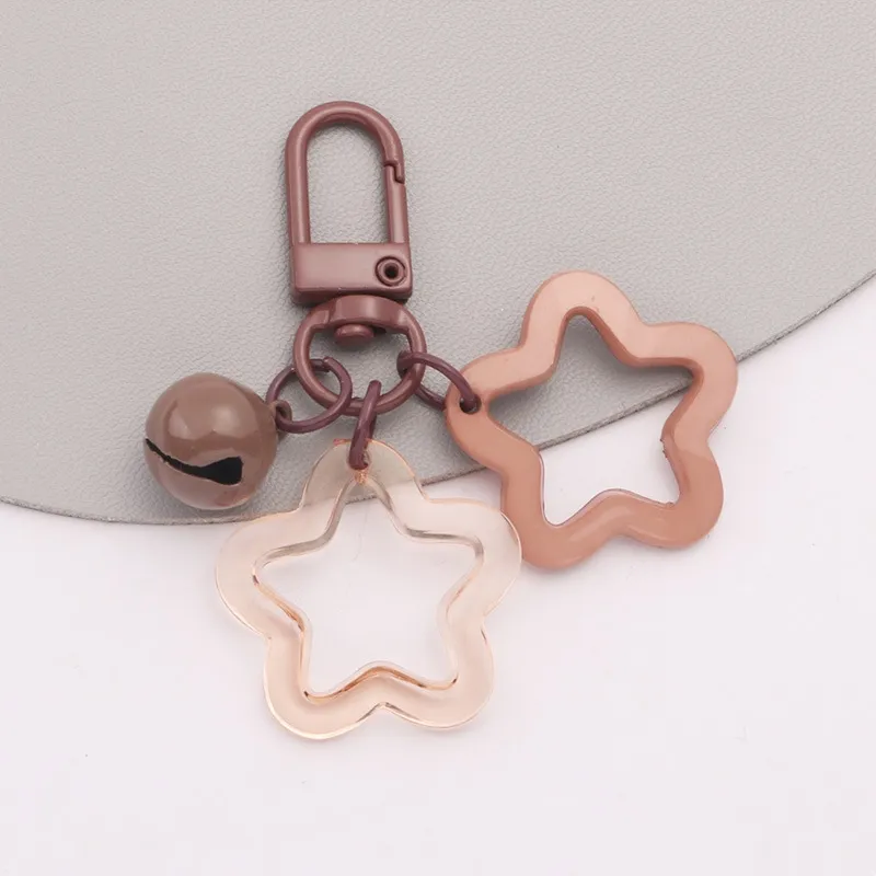 Promotion Acrylic hollowed out pentagram ins pendant keychain accessories Star keyring Cute candy color Star Bell Keychain charm